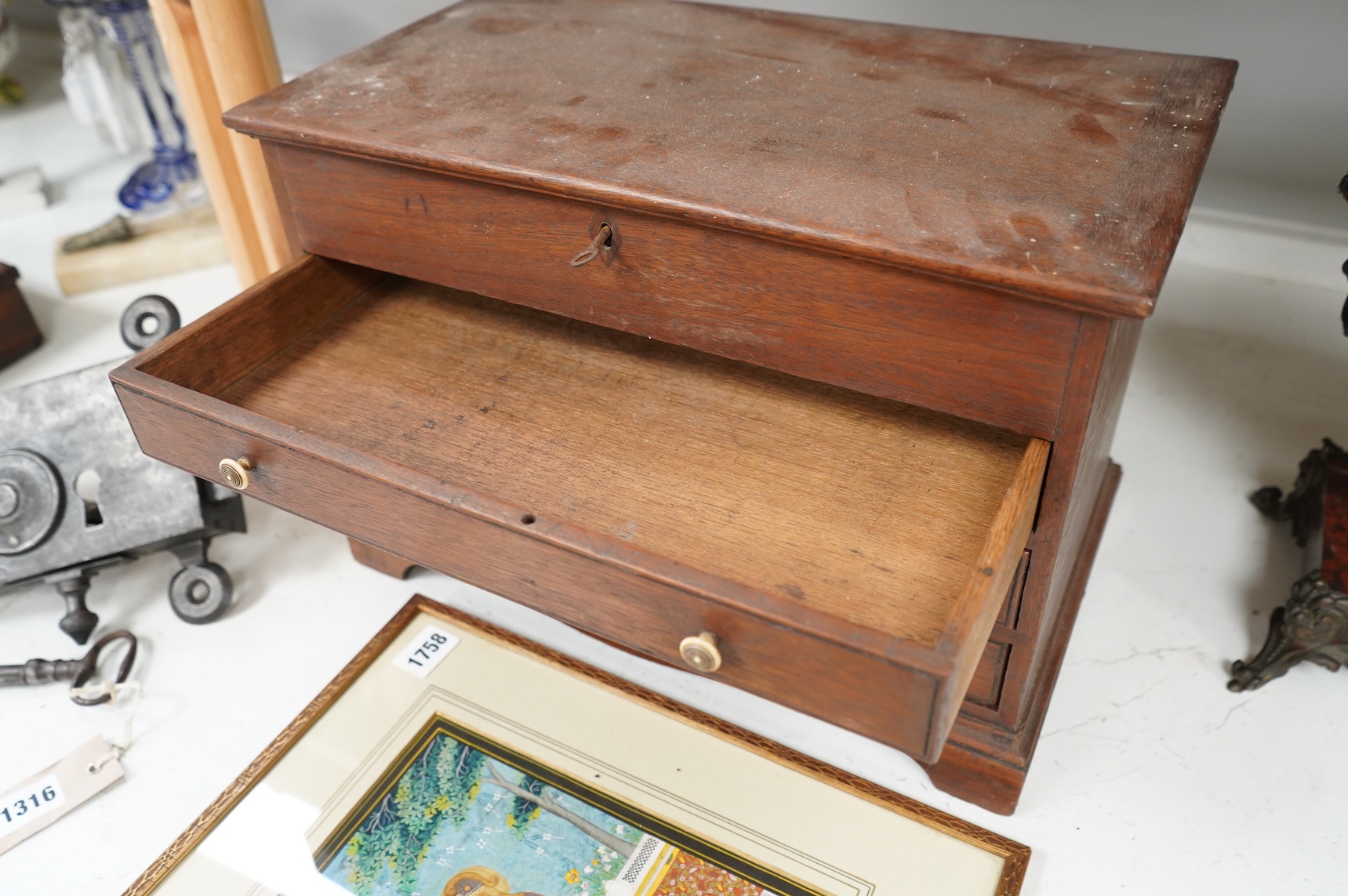 An early 19th century mahogany three drawer collector’s cabinet, with circular ivory handles, 40cm wide x 28cm high CITES Submission Reference O28HYZ0E